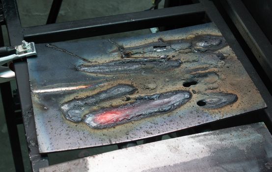 welding metal on  iron plate