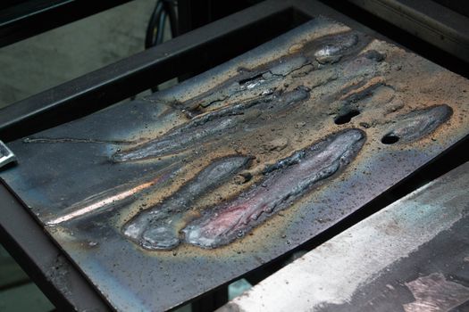welding metal on  iron plate