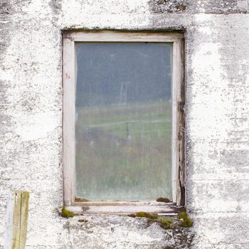 Old dirty window on old dirty wall