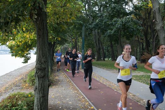 Budapest, Hungary - October 2 2016. Park Margit. Margitsziget Athletics Centre. Young people take part in October's Charity Run. This is the fourth year in a row that CEMS Club Budapest is organizing one of the highlights of the academic year, the CMS Charity Run. It give opportunity of raising donations targeting 500.000 HUF to Suhanj Foundation that gives back the joy of sport to disabled children and adults. Fitness and Health.
