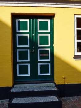 Traditional colorful craft vintage wooden green front door Denmark