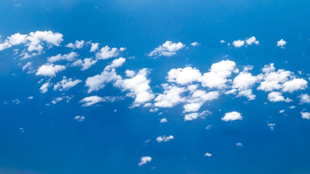 The beautiful cloudy and blue sky (view from airplane).