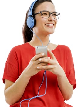 Happy woman listen music on her phone, isolated over white background 