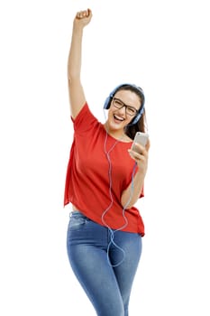 Happy woman listen music on her phone, isolated over white background 