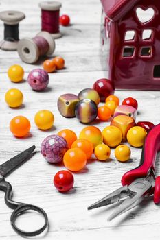 Yellow beads for jewelry making and tools