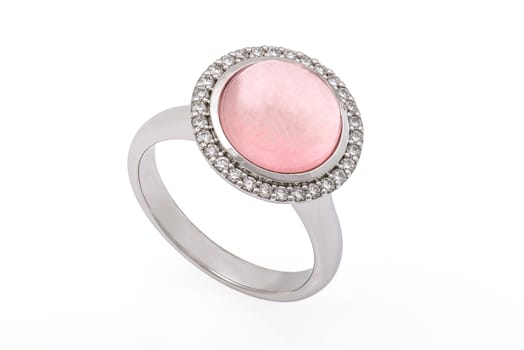 Silver ring with pink precious stone and diamonds on white background