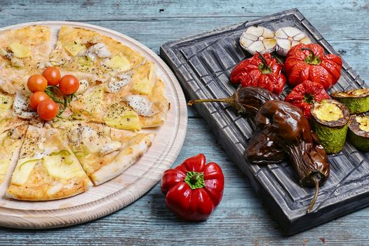 Pizza with beef and roasted red pepper with eggplant