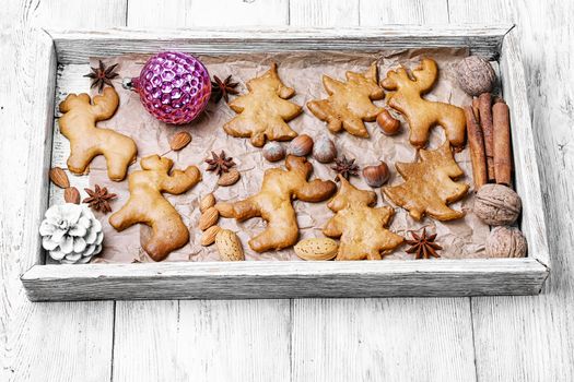 Symbolic box of homemade cookies for Christmas.Cookies in the shape of Christmas tree and reindeer