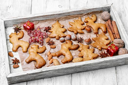 Symbolic box of homemade cookies for Christmas.Cookies in the shape of Christmas tree and reindeer