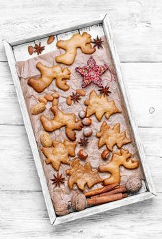 Symbolic box of homemade cookies for Christmas.Cookies in the shape of Christmas tree and reindeer