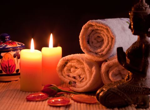 towels and candles for spa,and buddha