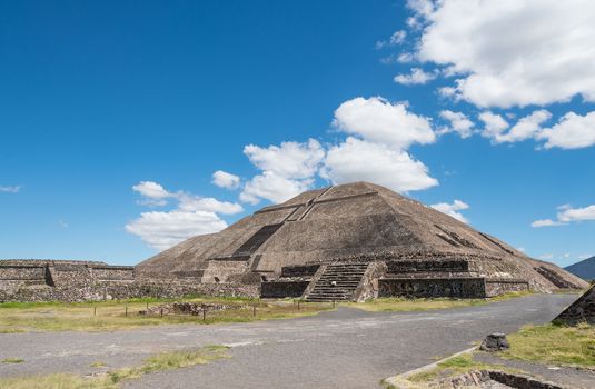 The Pyramid of the Sun is the largest pyramid in Teotihuacan and one of the largest in Mesoamerica. It's located on the Avenue of the Dead, in between the Pyramid of the Moon and the Ciudadela.