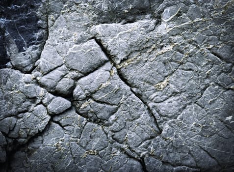 abstract background or texture dark stone with grooves