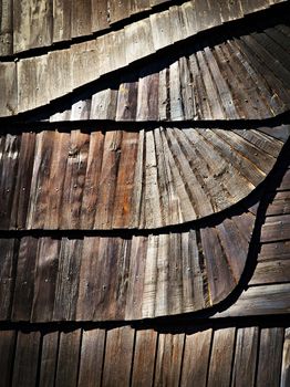 abstract background or texture Detail of wooden shingle roof with a tilde