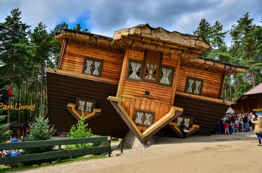 12 August 2016 Szymbark-Poland, Famous touristic attraction in Szymbark open air museum - House on Roof  which can be entered and offers surrealistic and dizzy sensations to visitors. Editorial photo.