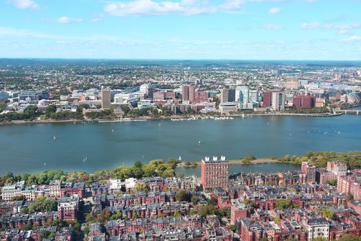 Aerial view of Boston skyline and Cambridge district separated by Charles River.