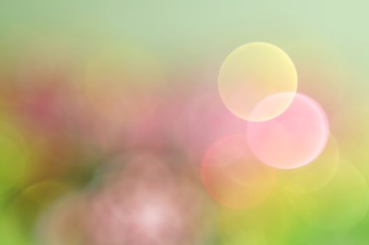 Abstract background with large, colorful holiday bokeh