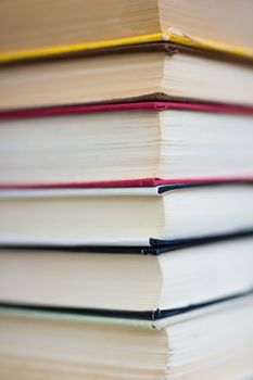 Closeup of stacked old books and textbook