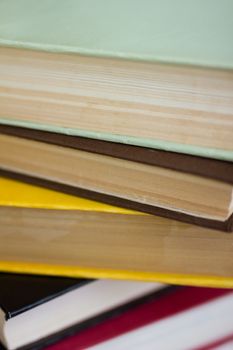 Closeup of stacked old books and textbook