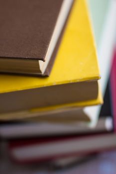 Closeup of stacked old books and textbook