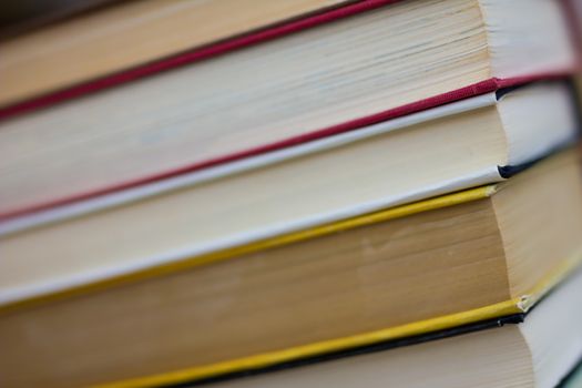 Closeup of stacked old books and textbook