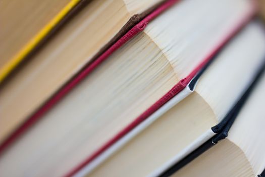 Closeup of stacked old books and textbook