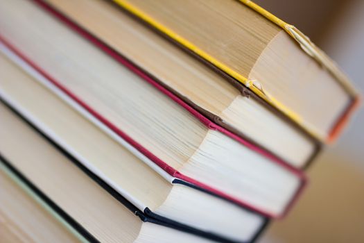 Closeup of stacked old books and textbook