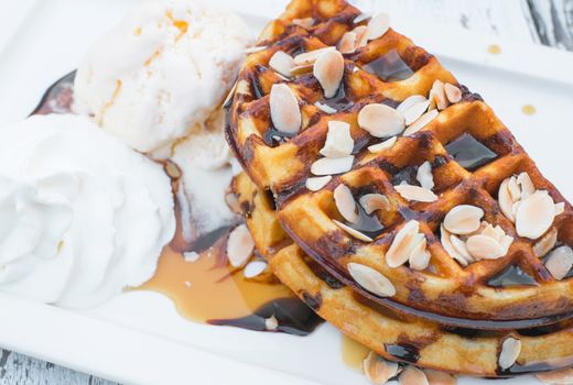 chocolate waffle on top with almond