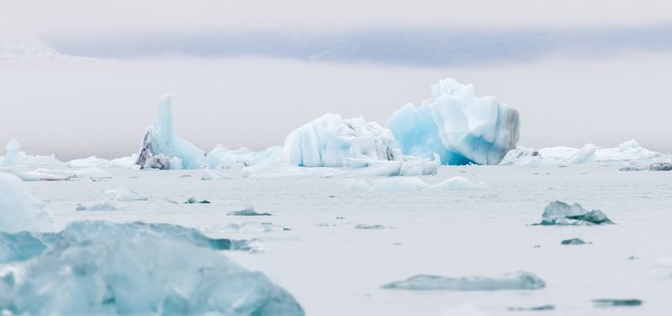 Jokulsarlon is a large glacial lake in southeast Iceland - Ice breaking of a glacier