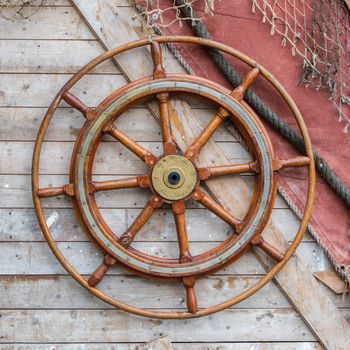 Hang helm on a wooden wall, vintage