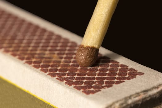 A match ready to strike.Close up