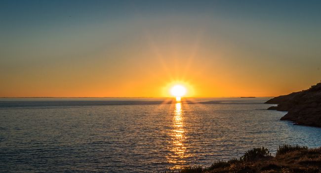 Sunset against the backdrop of the Atlantic Ocean in France