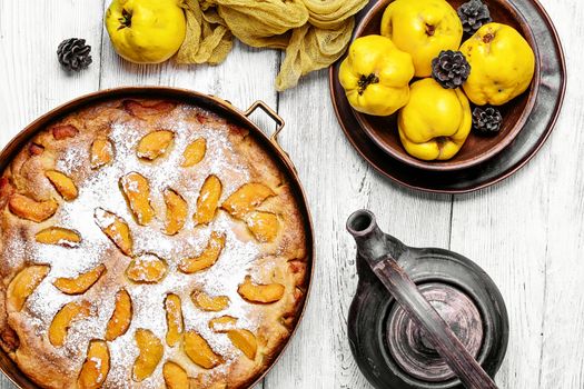 Pie autumn quinces baked in the stylish copper retro form