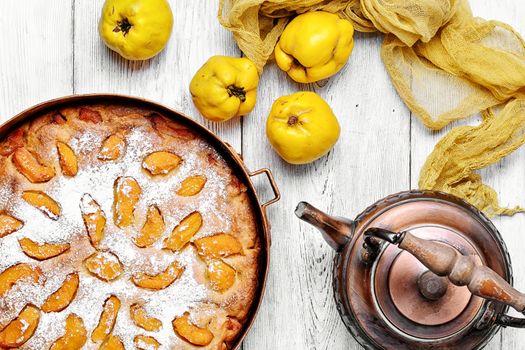 Pie autumn quinces baked in the stylish copper retro form