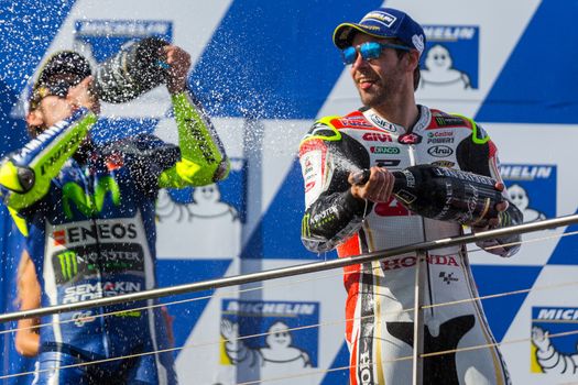 MELBOURNE, AUSTRALIA – OCTOBER 23: Cal Crutchlow on the podium spraying Champaign during the 2016 Michelin Australian Motorcycle Grand Prix  at 2106 Michelin Australian Motorcycle Grand Prix , Australia on October 23 2016. Photo: Dave Hewison