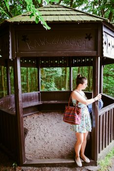 Portrait of romantic woman at fairy forest.