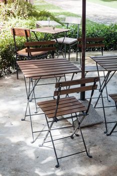 Decorated table and chair in coffee shop, stock photo