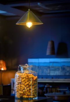 various old wine bottle corks in a glass vase