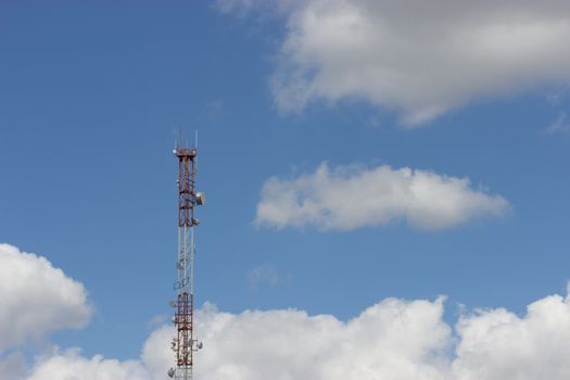 distant television tower on blue sky background
