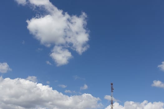 distant television tower on blue sky background