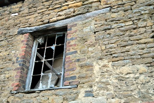 Window with wooden girder with all the tiles to break