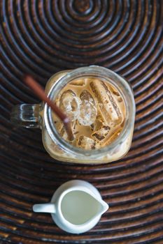 top view of ice coffee on wooden table