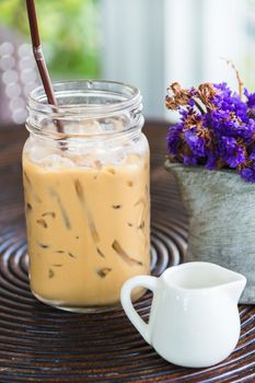 ice coffee on wooden table