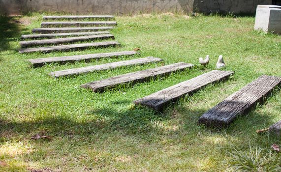 Old wooden pathway in garden, stock photo