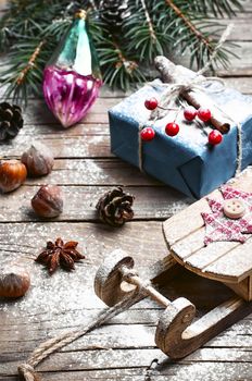 Christmas card with old fashioned Christmas sleigh of Santa Claus and Christmas gifts
