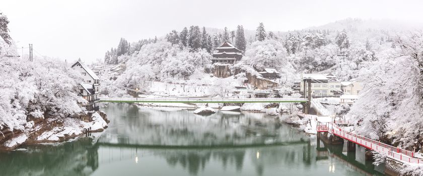 Winter Landcape with lake and village in Japan panorama