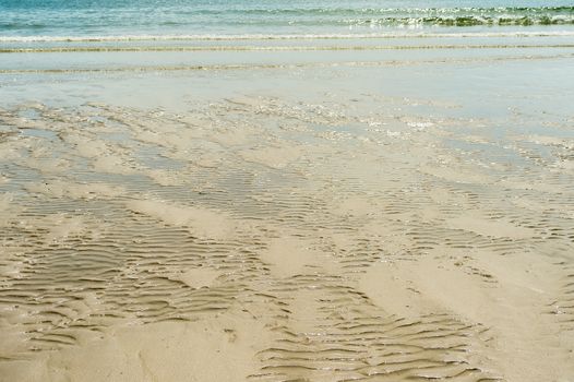 wavy sand on beach