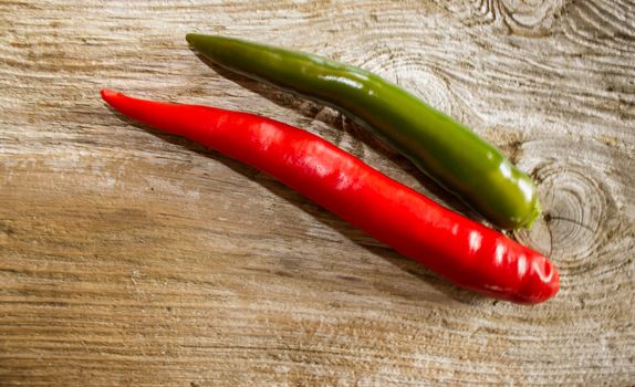 Chili pepper on weatered plank