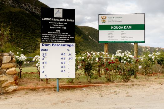The Kouga Dam is an arch dam on the Kouga River about 21 km west of Patensie in Kouga Local Municipality, South Africa.