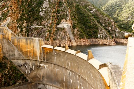 View of the Kouga Arch Dam wall with no water flowing over.